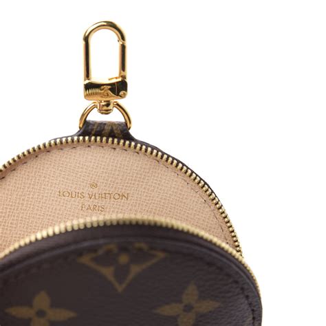 louis vuitton round coin purse|More.